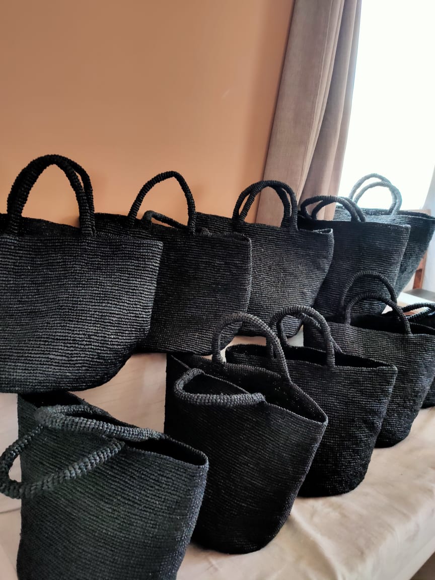 Caramel raffia beach tote bag in black, handwoven in Madagascar
